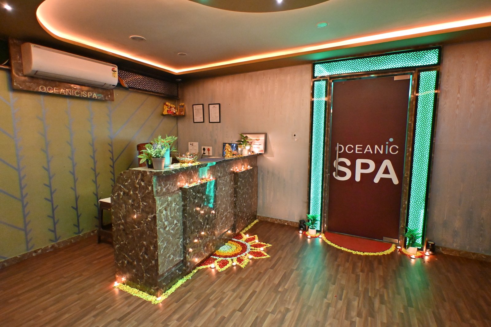 Modern spa room at Oceanic Spawith soft lighting and comfortable massage tables